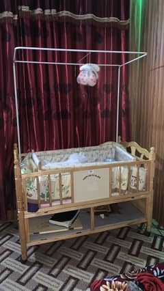 Baby's bed and swing.