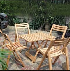 garden folding chairs and center table