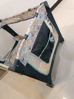 Ingenuity Foldable cot/ Playard with changing basin and dream center