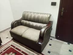 7 seater sofa set brown color wood and form only 1 year used .