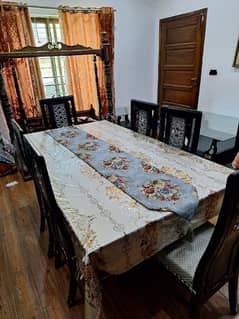 wood six seater dining table