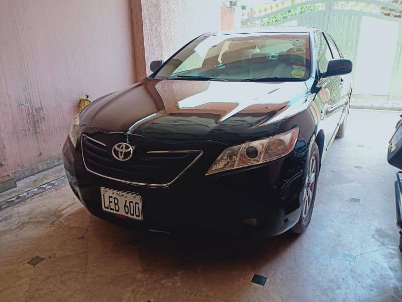 Toyota Camry 2006 model fully loaded and less driven 1