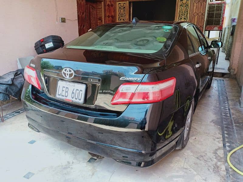 Toyota Camry 2006 model fully loaded and less driven 4