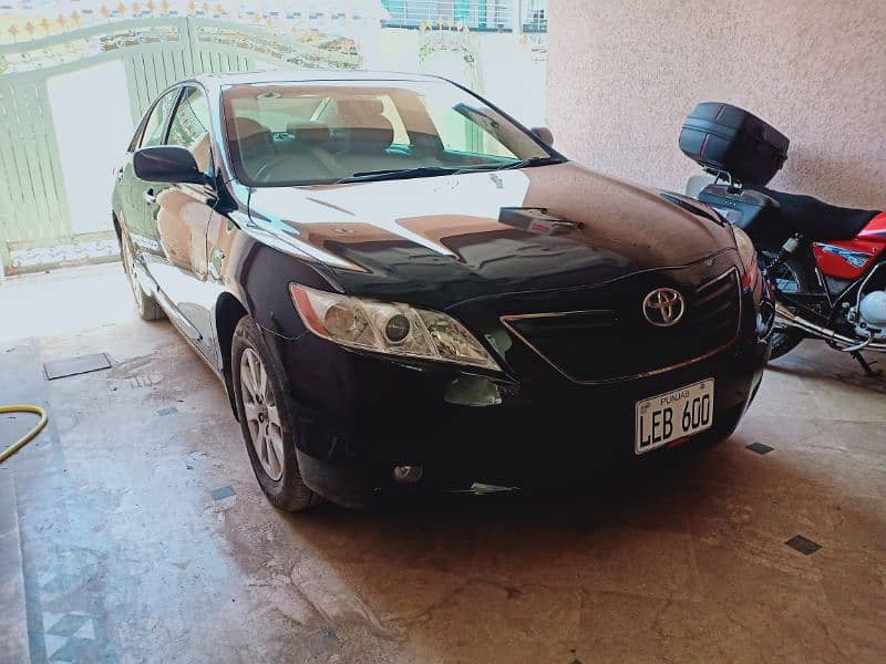 Toyota Camry 2006 model fully loaded and less driven 5