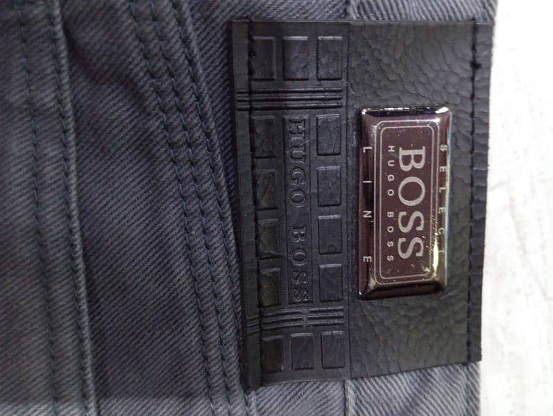 original Brand new Hugo Boss in grey colour for sale. 1