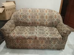 Brown Sofa Set with covers.