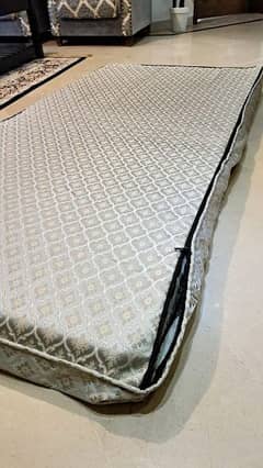 Single mattress with cover