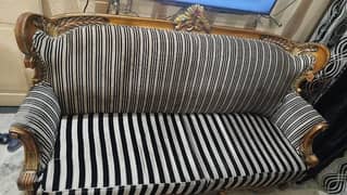 Three seater sofa with black and silver print