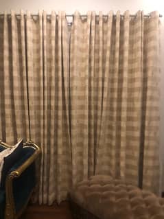 beige colour curtain and inner goerget curtain