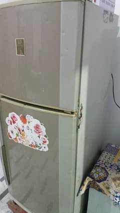 Medium size refrigerator for sale in running condition