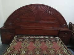 Double wooden bed in Genuine condition.