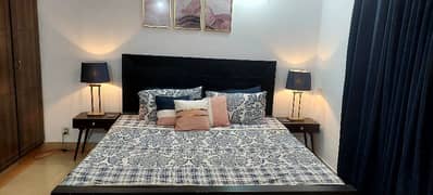double bed with side table sofa
