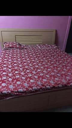 wooden king-size bed in good condition without mattress