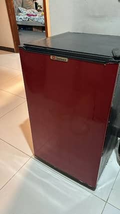 medium-sized fridge for sale, only serious buyers will be entertained.