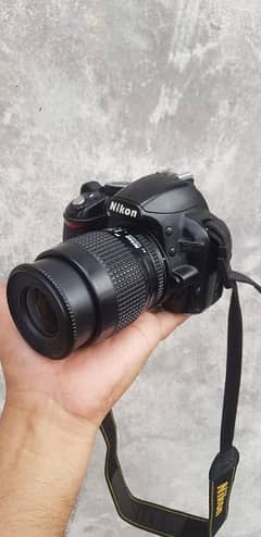 Nikon Camera D3100 with 35-80mm lens and Battery and Charger