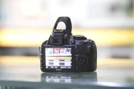 Nikon dslr D3100 with 50mm lens for beginer shots read ad