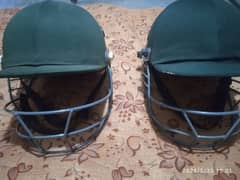 2 cricket helmets