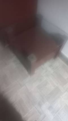 one glass table with 2 side tables in a good condition