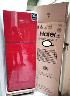 Brand New condition Haire Glass door fridge 4 moth used 03095449689