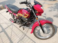 Honda pridor 100cc  red colour  registration all Punjab