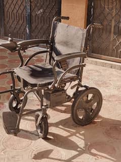 ELECTRIC WHEEL CHAIR WITH DUAL MOTORS