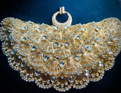 Shining beautiful bridal golden clutch