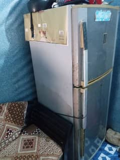 Refrigerator for sale company name is Dawlance