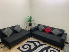 5 Seater sofa with Two seats & and cushions along with rug