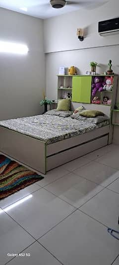 bed with a sliding bed and mattress