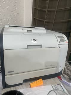 HP CP2025, coloured printer 100% working condition. all colour tonners
