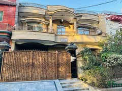 TEN MARLA FACING PARK DOUBLE STOREY HOUSE IN SABZAZAR HOT BLOCK K VERY PRIME LOCATION