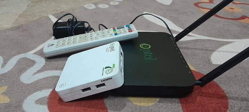 [2 DEVICES] Optical Fiber router + free Android Box with remote 1