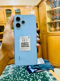 redmi 12 with blue colour condition 10/10 8/128 with box and charger