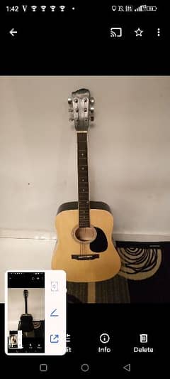 two brand new acoustic guitar