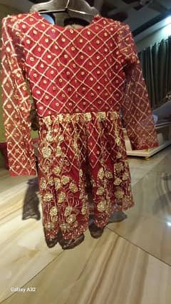 Red Formal Frock Featuring  Mesmerizing Golden Embroidery