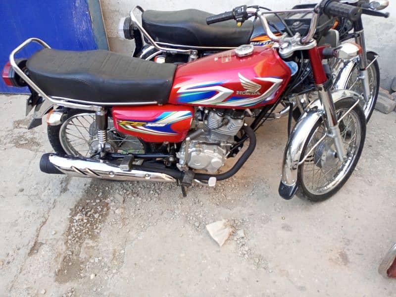 Honda 125 , mdl 2022,condition very good, sealed engine 2