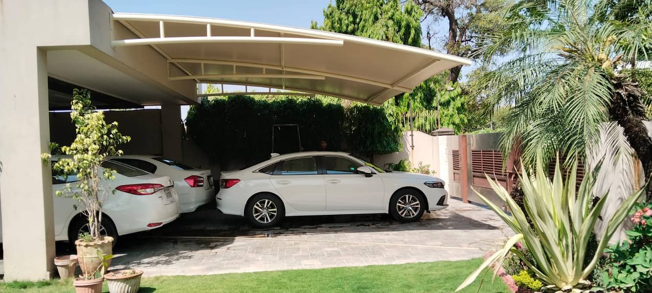 car parking shade\car shed\Fiber Shades\Tensile Shades\sheds 0