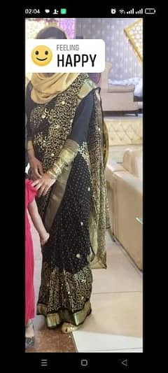 black golden sitara work saree
