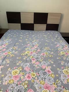 Bed set along with mattress and a single side table