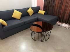 Interwood L shape sofa with Interwood glass table