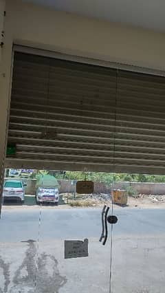 Glass door 10.5×10.8 for sell used in shop in good condition
