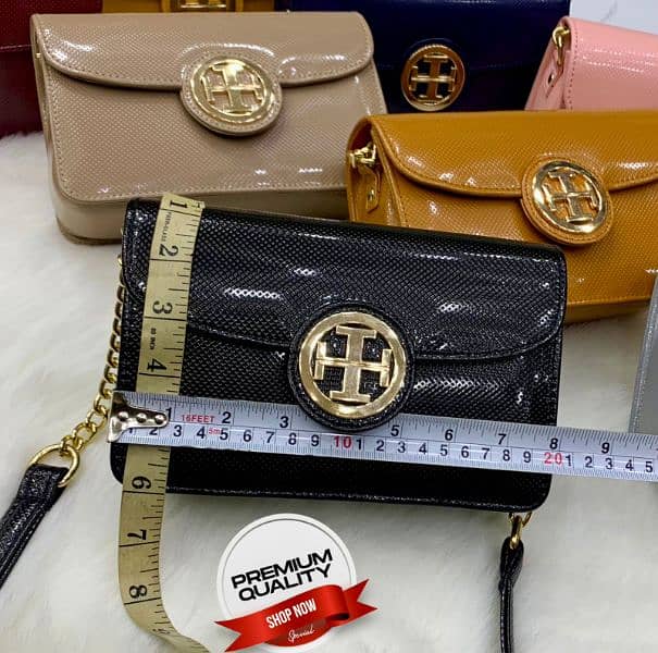 *Premium High Quality*

   TORY BURCH 9