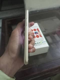 Oppo A57 6/128 Complete box in very good condition with back cover.