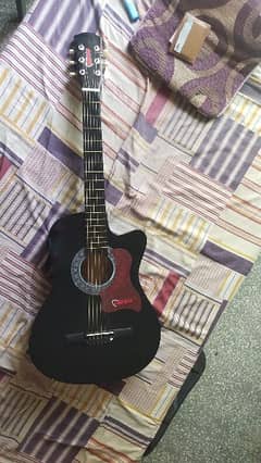 guitar with it's bag for sale