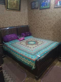 double bed with side table, mirror table with side cabinet, iron stand