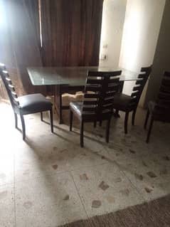dinning table glass top wirh 6 chairs