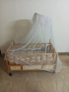 Baby cot with swing (cradle) in new condition.