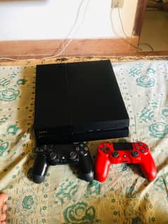 PS4 with box and 2 controllers