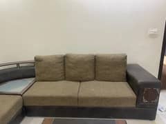 L shape sofa with center table and matching carpet