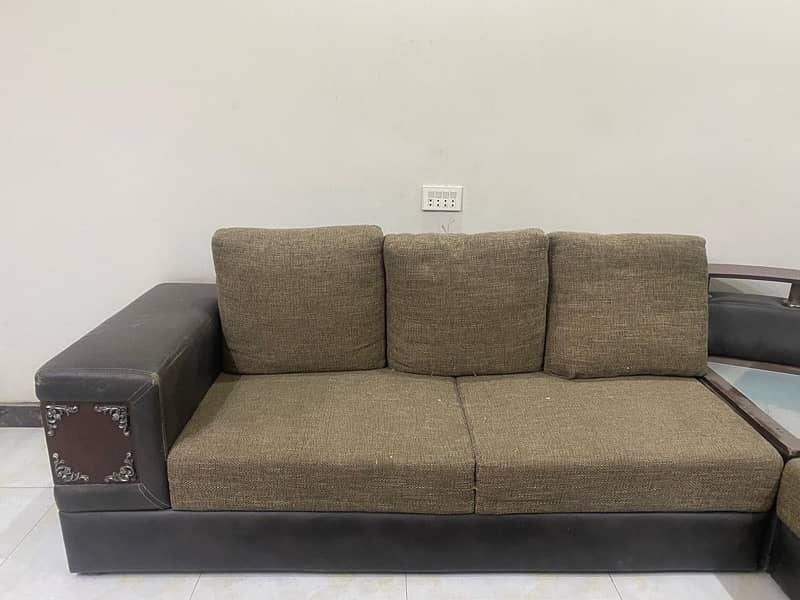 L shape sofa with center table and matching rug 1